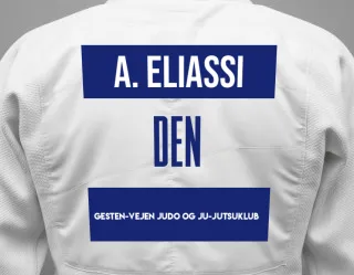 Judo GI with a backnumber showing the name Adam Eliassi from Gesten-Vejen Judo og Ju-jutsuklub