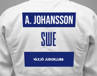 Judo GI with a backnumber showing the name Adam Johansson from Växjö Judoklubb