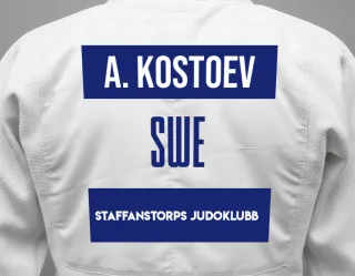 Judo GI with a backnumber showing the name Adam Kostoev from Staffanstorps Judoklubb
