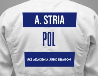 Judo GI with a backnumber showing the name Adrian Stria from UKS Akademia Judo Dragon