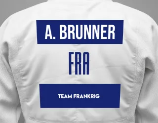 Judo GI with a backnumber showing the name Alan Brunner from Team Frankrig