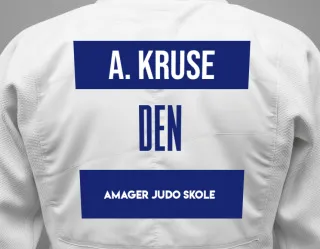 Judo GI with a backnumber showing the name Alma Kruse from Amager Judo Skole