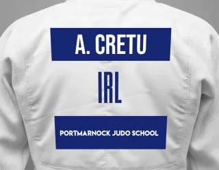 Judo GI with a backnumber showing the name Andrew Cretu from Portmarnock Judo School