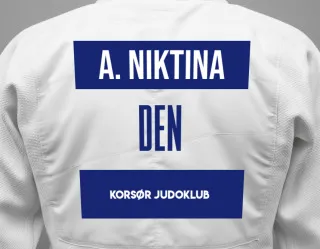 Judo GI with a backnumber showing the name Artem Niktina from Korsør Judoklub