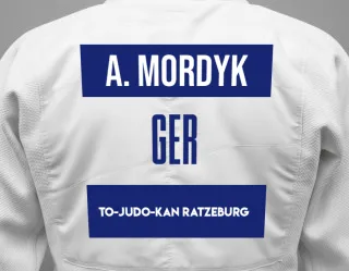 Judo GI with a backnumber showing the name Artur Mordyk from To-Judo-Kan Ratzeburg