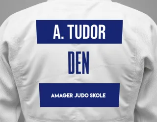 Judo GI with a backnumber showing the name Attis Tudor from Amager Judo Skole