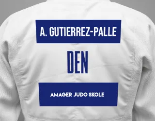 Judo GI with a backnumber showing the name August Gutierrez-Palle from Amager Judo Skole