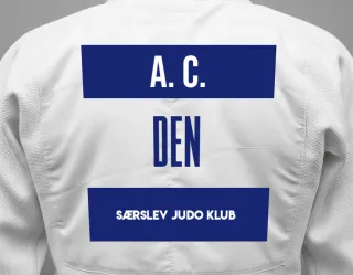 Judo GI with a backnumber showing the name Axholt Calina C. from Særslev Judo Klub