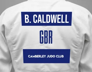 Judo GI with a backnumber showing the name Ben Caldwell from Camberley Judo Club