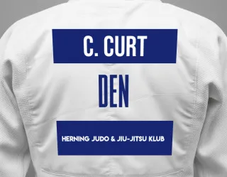 Judo GI with a backnumber showing the name Cal Conzcels Curt from Herning Judo & Jiu-Jitsu Klub