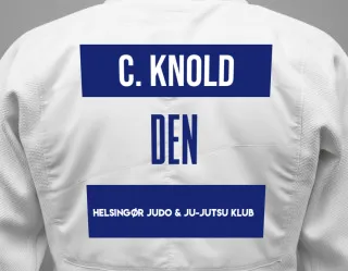 Judo GI with a backnumber showing the name Caspian Knold from Helsingør Judo & Ju-Jutsu Klub