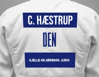 Judo GI with a backnumber showing the name Cathrine Hæstrup from Sjelle-Skjørring Judo