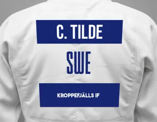 Judo GI with a backnumber showing the name Cedervall Claesson Tilde from Kroppefjälls IF