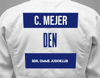 Judo GI with a backnumber showing the name Celica Mejer from Sdr. Omme judoklub