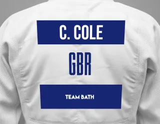 Judo GI with a backnumber showing the name Charlie Cole from Team Bath
