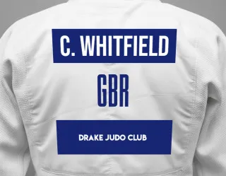 Judo GI with a backnumber showing the name Charlie Whitfield from Drake Judo Club