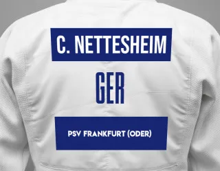 Judo GI with a backnumber showing the name Charlotte Nettesheim from PSV Frankfurt (Oder)