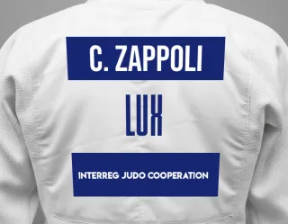 Judo GI with a backnumber showing the name Chloé Zappoli from Interreg Judo Cooperation