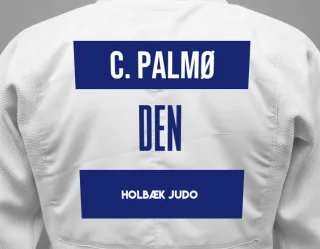 Judo GI with a backnumber showing the name Christoffer Palmø from Holbæk Judo
