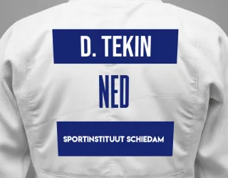 Judo GI with a backnumber showing the name Destan Tekin from Sportinstituut Schiedam