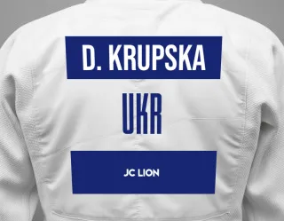 Judo GI with a backnumber showing the name Diana Krupska from JC LION