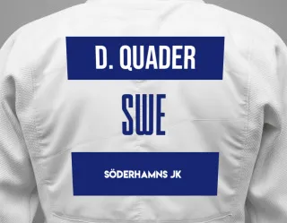 Judo GI with a backnumber showing the name Dulfi Quader from Söderhamns JK