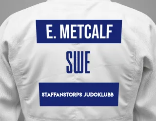 Judo GI with a backnumber showing the name Elian Metcalf from Staffanstorps Judoklubb