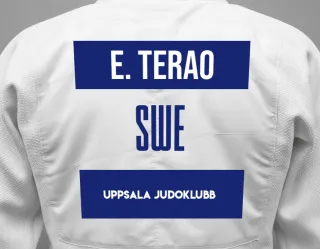 Judo GI with a backnumber showing the name Emelie Terao from Uppsala judoklubb