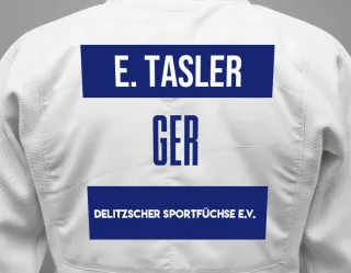 Judo GI with a backnumber showing the name Erik Tasler from Delitzscher Sportfüchse e.V.