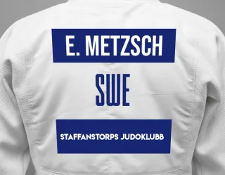 Judo GI with a backnumber showing the name Esben Metzsch from Staffanstorps Judoklubb