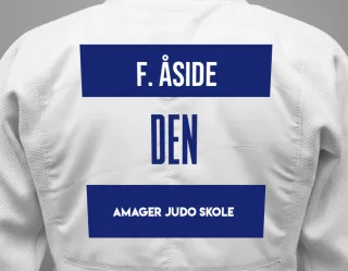 Judo GI with a backnumber showing the name Felix Åside from Amager Judo Skole