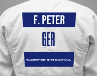 Judo GI with a backnumber showing the name Felix Peter from Polizeisportverein Ribnitz-Damgarten e.V.