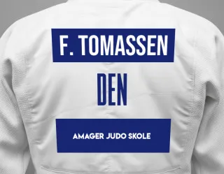 Judo GI with a backnumber showing the name Felix Tomassen from Amager Judo Skole