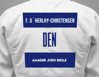 Judo GI with a backnumber showing the name Ferdia O´herlhy-Christensen from Amager Judo Skole