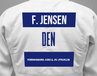 Judo GI with a backnumber showing the name Frederik Emil Jensen from Vordingborg judo & jiu jitsuklub