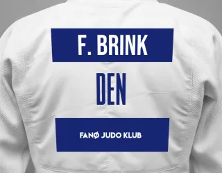 Judo GI with a backnumber showing the name Frej Moeskjær Brink from Fanø Judo Klub