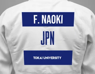 Judo GI with a backnumber showing the name Fujimi Naoki from Tokai University