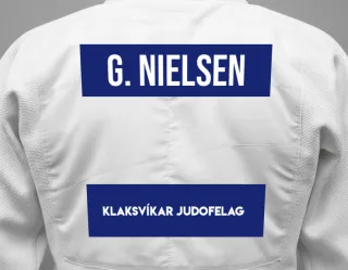 Judo GI with a backnumber showing the name Gunrid Nielsen from Klaksvíkar Judofelag