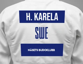 Judo GI with a backnumber showing the name Herman Karela from Näsets Budoklubb