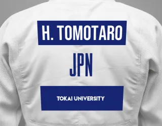 Judo GI with a backnumber showing the name Hosono Tomotaro from Tokai University