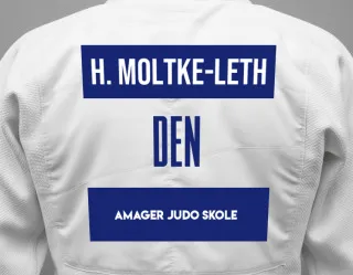 Judo GI with a backnumber showing the name Hugo Moltke-Leth from Amager Judo Skole