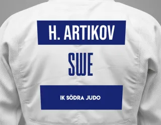 Judo GI with a backnumber showing the name Husniddin Artikov from IK Södra Judo
