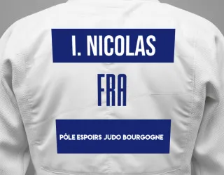 Judo GI with a backnumber showing the name Ielena Nicolas from Pôle Espoirs Judo Bourgogne