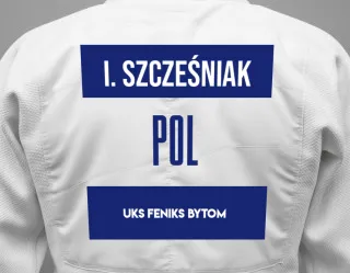 Judo GI with a backnumber showing the name Igor Szcześniak from UKS FENIKS Bytom