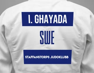 Judo GI with a backnumber showing the name Isabella Ghayada from Staffanstorps Judoklubb