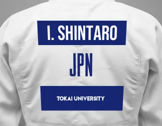Judo GI with a backnumber showing the name Ishimoto Shintaro from Tokai University