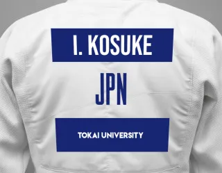 Judo GI with a backnumber showing the name Ishizaki Kosuke from Tokai University