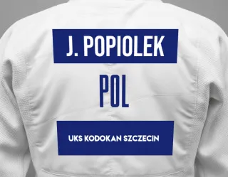 Judo GI with a backnumber showing the name Jan Popiolek from UKS Kodokan Szczecin
