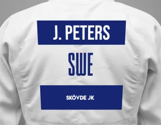 Judo GI with a backnumber showing the name Jette Peters from Skövde JK