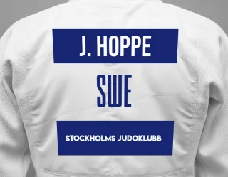 Judo GI with a backnumber showing the name Julia Hoppe from Stockholms Judoklubb